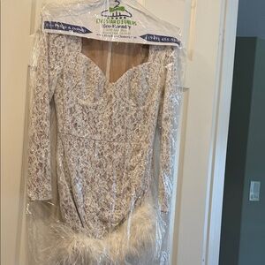 Elegant Lace Dress with Feather Trim